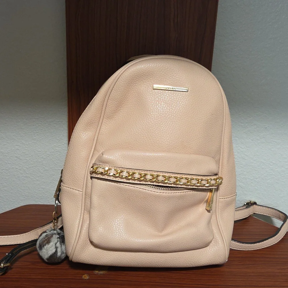 Elegant Light Pink Backpack with Gold Accents